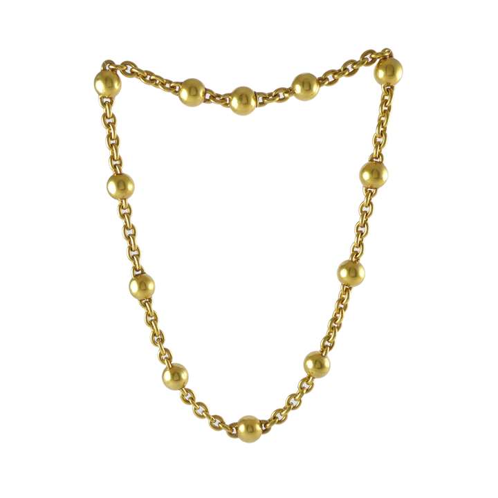 19th century gold ball and tracelink chain necklace, c.1880, bold links spaced by twelve uniform gold balls,